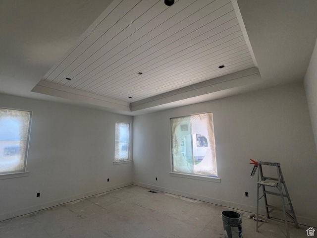 643 W Summerhill Ln, Centerville, UT 84014 - spare room featuring a tray ceiling and wood ceiling