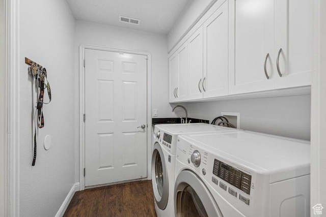 1755 E 2370 S, St George, UT 84790 - laundry room featuring cabinet space, washer and clothes dryer, and dark wood finished floors