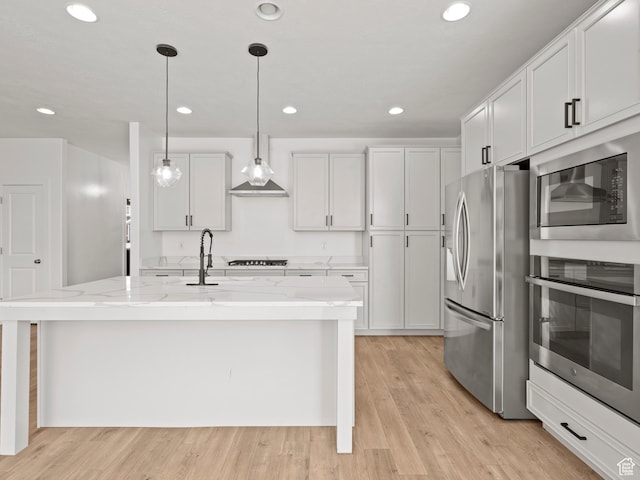 928 S 120 W, American Fork, UT 84003 - kitchen featuring stainless steel appliances, recessed lighting, light stone countertops, and light wood-style floors