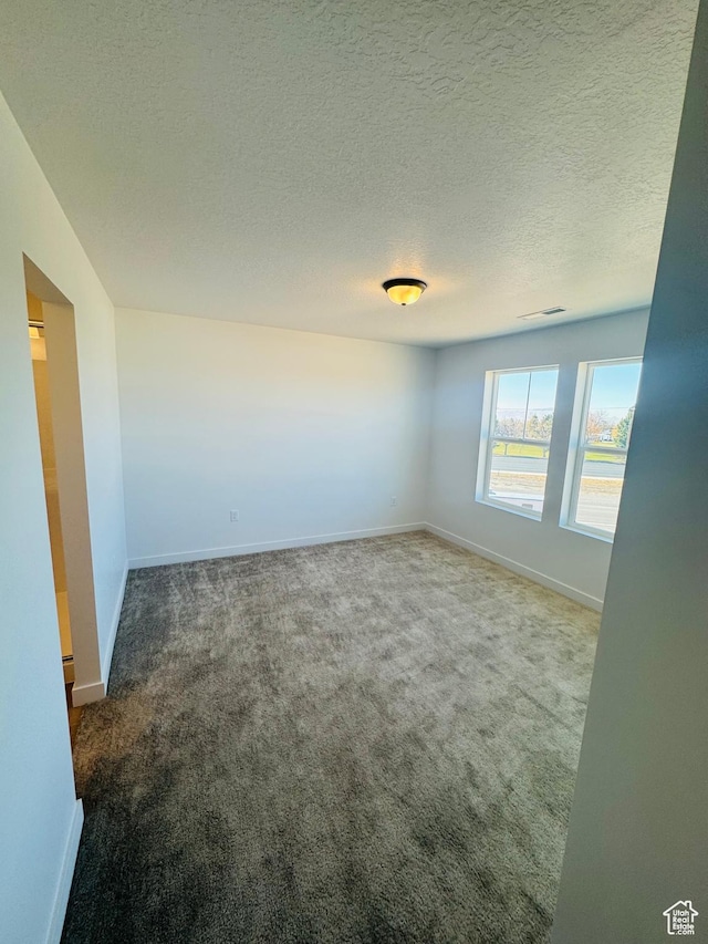 1650 N Main St Unit 126, Layton, UT 84041 - empty room featuring carpet and a textured ceiling