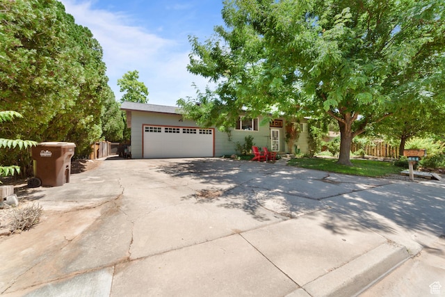 684 N Mccormick Blvd, Moab, UT 84532 - view of front of home with an attached garage and driveway