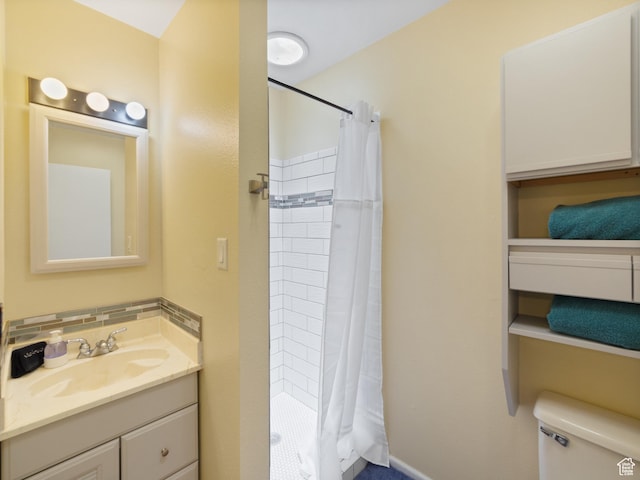 684 N Mccormick Blvd, Moab, UT 84532 - full bathroom featuring vanity, a shower stall, and decorative backsplash