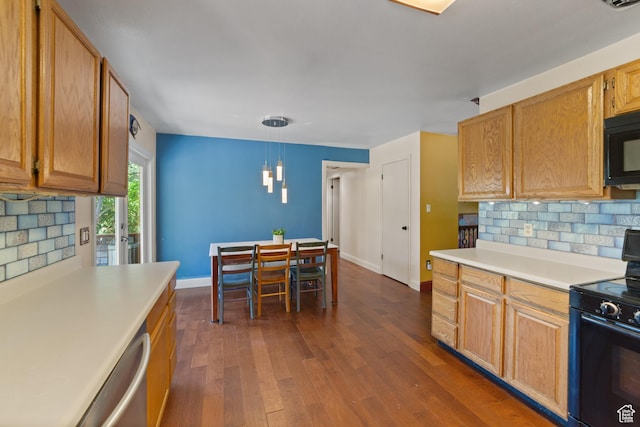 684 N Mccormick Blvd, Moab, UT 84532 - kitchen featuring black appliances, backsplash, light countertops, and dark wood-style floors
