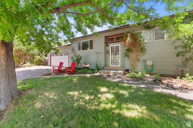 684 N Mccormick Blvd, Moab, UT 84532 - ranch-style house featuring a garage, a front yard, and driveway