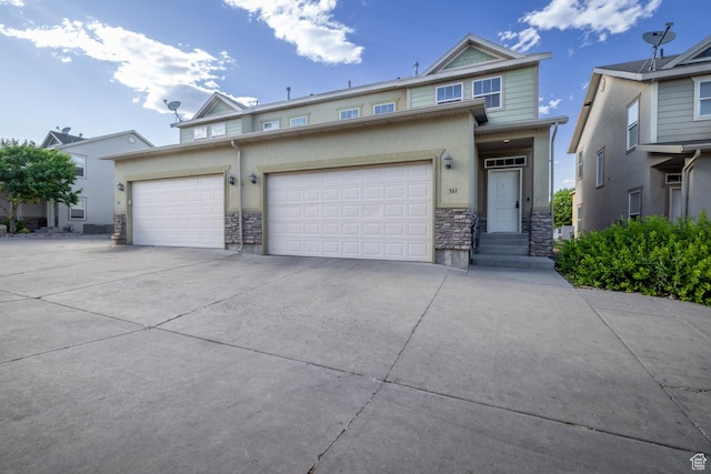 361 E 535 S, Vernal, UT 84078 - view of front of house with stone siding, concrete driveway, and stucco siding