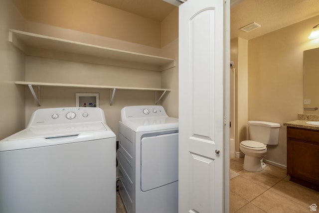 361 E 535 S, Vernal, UT 84078 - washroom featuring independent washer and dryer and light tile patterned flooring