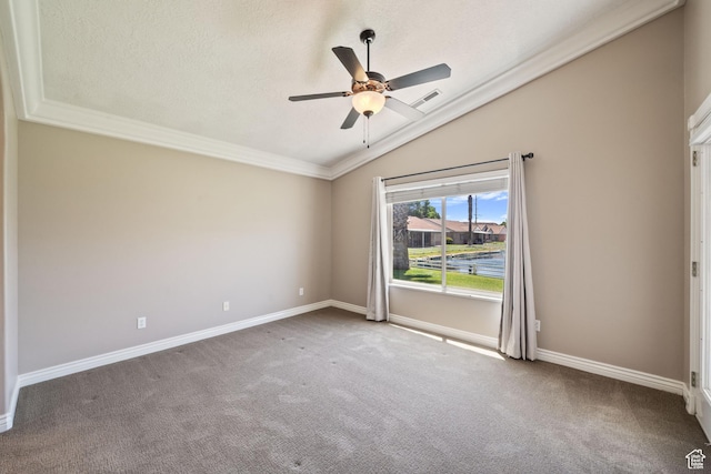 805 S River Rd Unit 65, St George, UT 84790 - carpeted empty room with vaulted ceiling, ornamental molding, ceiling fan, and a textured ceiling