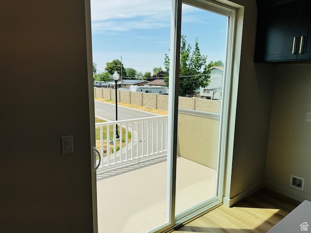 1682 N 1600 W Unit 124, Layton, UT 84041 - entryway featuring wood finished floors and baseboards