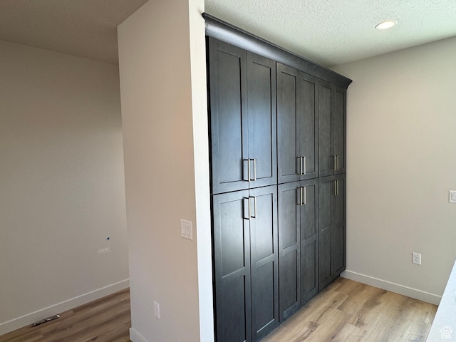 1682 N 1600 W Unit 124, Layton, UT 84041 - detailed view of wood finished floors and recessed lighting