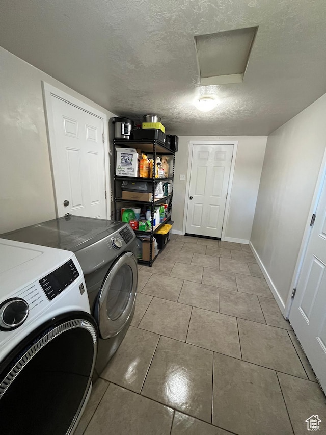 1194 W 400 S, Orem, UT 84058 - washroom with washer and dryer, attic access, tile patterned floors, and a textured ceiling
