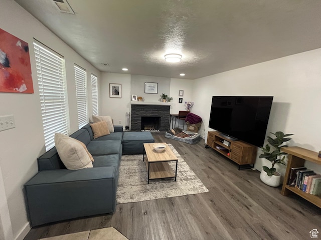 1194 W 400 S, Orem, UT 84058 - living area with wood finished floors, a stone fireplace, and recessed lighting