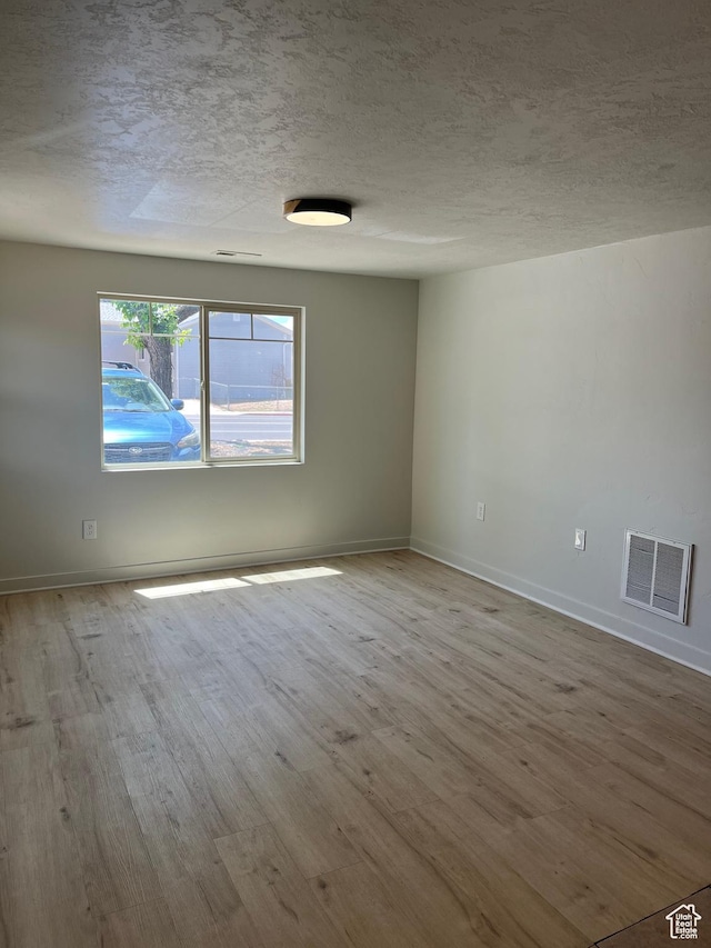 1194 W 400 S, Orem, UT 84058 - empty room with wood finished floors and a textured ceiling