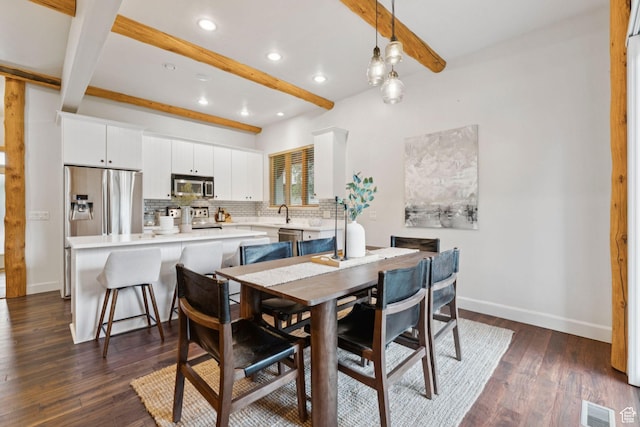 92 W Village Ct, Midway, UT 84049 - dining space with beamed ceiling, recessed lighting, and dark wood-type flooring