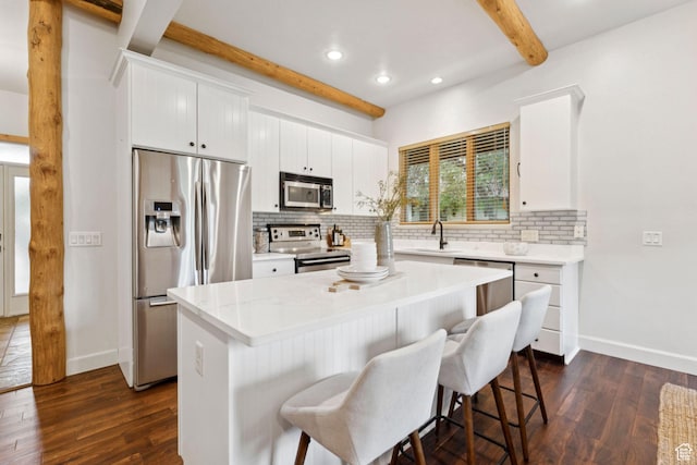 92 W Village Ct, Midway, UT 84049 - kitchen featuring stainless steel appliances, beamed ceiling, tasteful backsplash, dark wood-style flooring, and recessed lighting