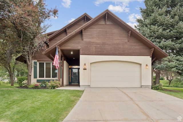 92 W Village Ct, Midway, UT 84049 - view of front of property with a garage, driveway, a front yard, and stucco siding