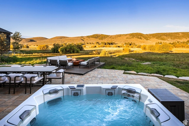 4746 Old Meadow Ln, Park City, UT 84098 - view of pool featuring a mountain view, a patio, an outdoor living space with a fire pit, and a hot tub