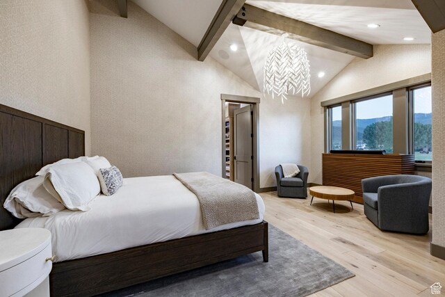 4746 Old Meadow Ln, Park City, UT 84098 - bedroom with beam ceiling, light wood-style floors, recessed lighting, a mountain view, and high vaulted ceiling