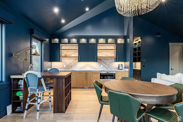 4746 Old Meadow Ln, Park City, UT 84098 - kitchen featuring vaulted ceiling, recessed lighting, light wood-type flooring, tasteful backsplash, and a chandelier