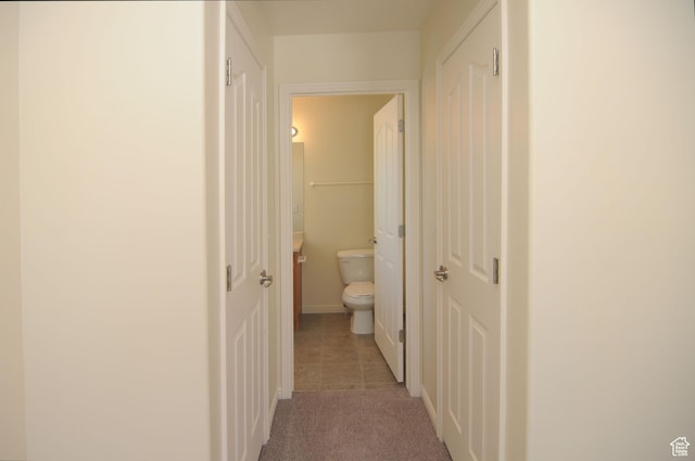 1511 W Leonardo Ln Unit D, West Valley City, UT 84119 - hall featuring light carpet
