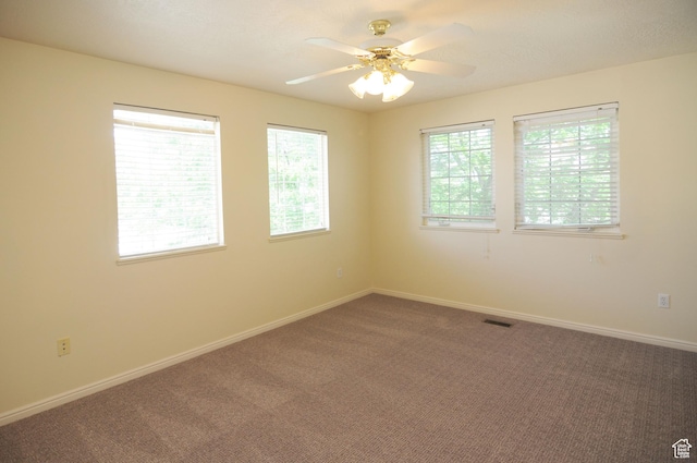 1511 W Leonardo Ln Unit D, West Valley City, UT 84119 - carpeted empty room with baseboards and a ceiling fan