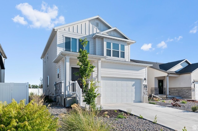 421 W Domain Ln, Grantsville, UT 84029 - view of front of home featuring a garage, driveway, and stone siding