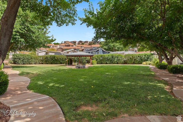 1160 E Telegraph Unit 227, Washington, UT 84780 - view of green lawn with a gazebo and a residential view