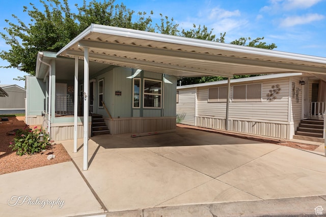 1160 E Telegraph Unit 227, Washington, UT 84780 - view of vehicle parking featuring an attached carport