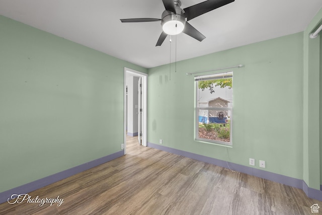 1160 E Telegraph Unit 227, Washington, UT 84780 - spare room with wood finished floors and a ceiling fan