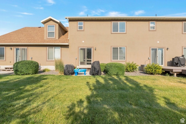 721 S 110 W, Spanish Fork, UT 84660 - rear view of house with a lawn, stucco siding, and roof with shingles