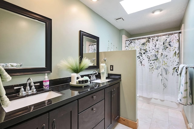 9506 Silver Creek Rd, Park City, UT 84098 - bathroom featuring double vanity, shower / bath combination with curtain, and tile patterned flooring