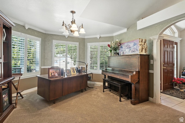 1680 N Camelot Dr E, North Logan, UT 84341 - carpeted office space with a chandelier, arched walkways, crown molding, and ornate columns