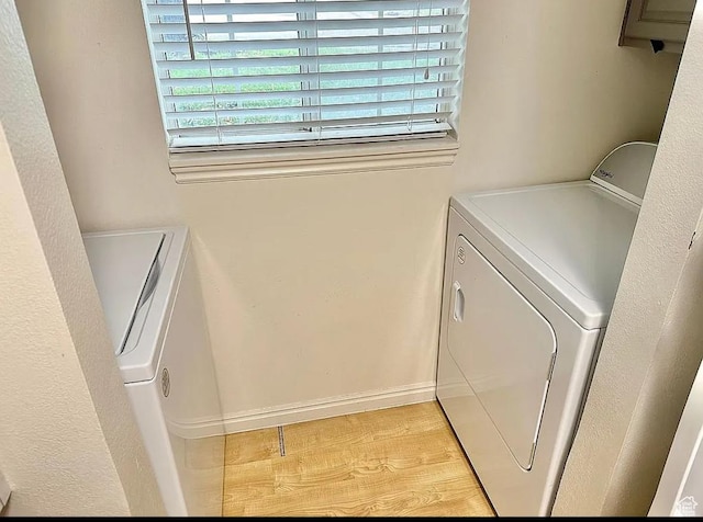 650 S Main St Unit 6111, Bountiful, UT 84010 - washroom with washing machine and clothes dryer and light wood-style flooring