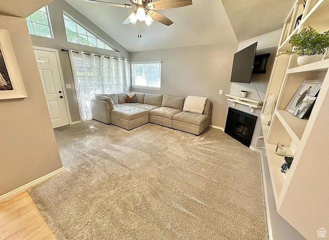 650 S Main St Unit 6111, Bountiful, UT 84010 - living room featuring a ceiling fan, lofted ceiling, and a fireplace