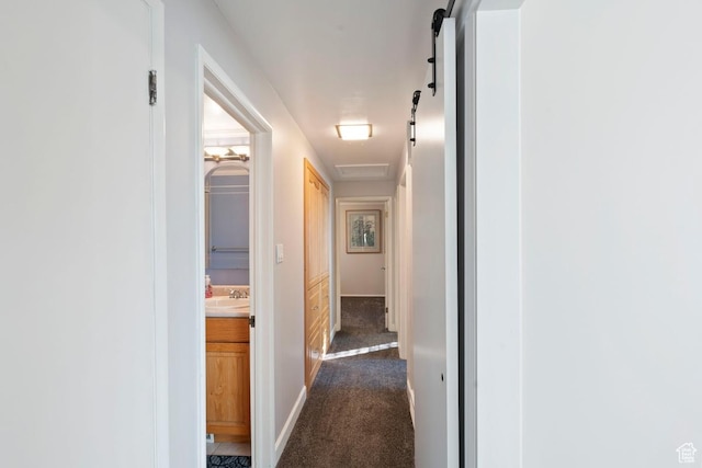 2793 S Davis Blvd, Bountiful, UT 84010 - hallway featuring dark carpet and a sink