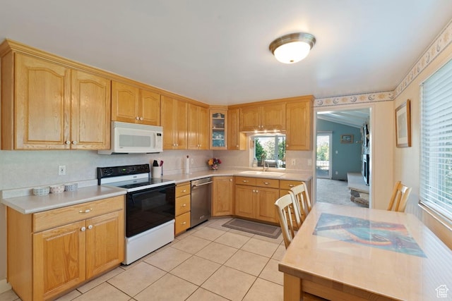2793 S Davis Blvd, Bountiful, UT 84010 - kitchen featuring white appliances, light countertops, glass insert cabinets, light tile patterned floors, and backsplash
