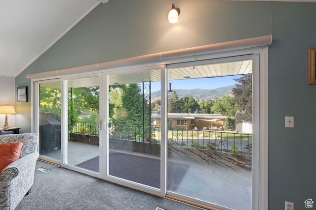 2793 S Davis Blvd, Bountiful, UT 84010 - doorway to outside featuring vaulted ceiling, carpet floors, a mountain view, and healthy amount of natural light