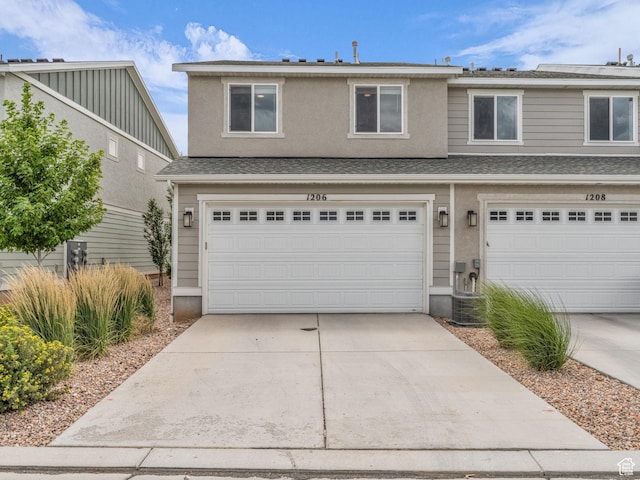 1206 W Summit Ridge Pkwy S Unit 182, Santaquin, UT 84655 - traditional-style home featuring concrete driveway and a garage
