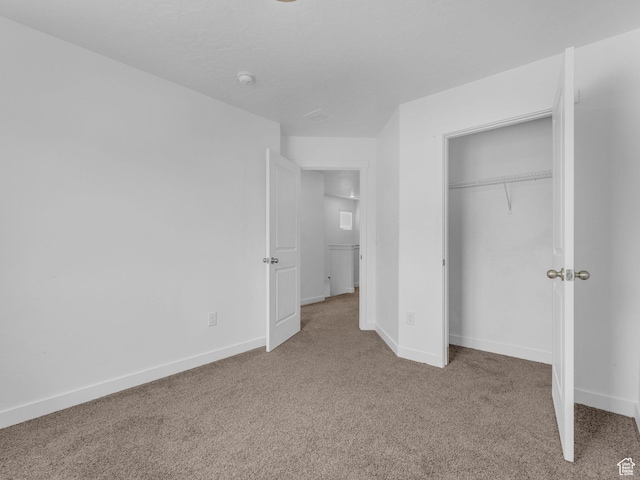 1206 W Summit Ridge Pkwy S Unit 182, Santaquin, UT 84655 - unfurnished bedroom featuring carpet and a closet