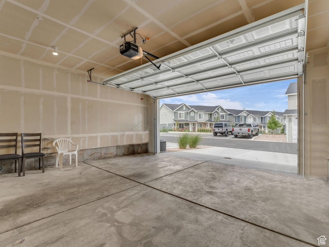 1206 W Summit Ridge Pkwy S Unit 182, Santaquin, UT 84655 - garage with a garage door opener and a residential view