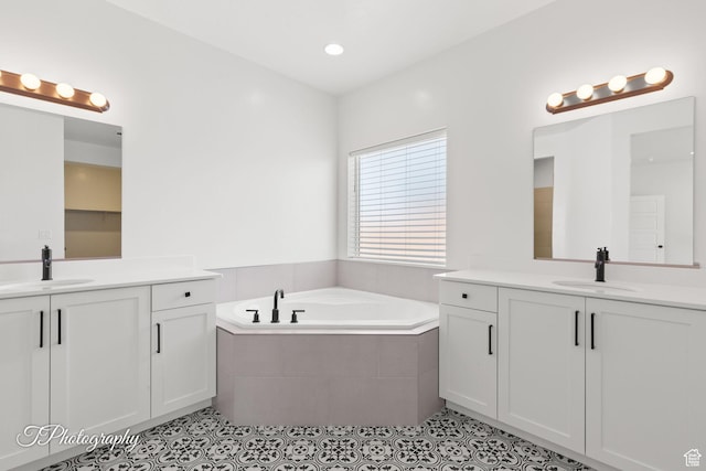 1516 E Mountain Trl, St George, UT 84790 - bathroom with two vanities, tile patterned floors, and a bath