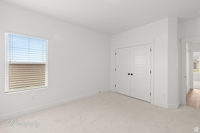 1516 E Mountain Trl, St George, UT 84790 - unfurnished bedroom with carpet and a closet