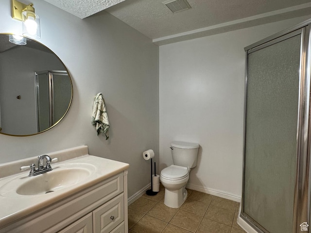 1216 N 2725 W, Layton, UT 84041 - full bathroom featuring vanity, a shower stall, tile patterned flooring, and a textured ceiling