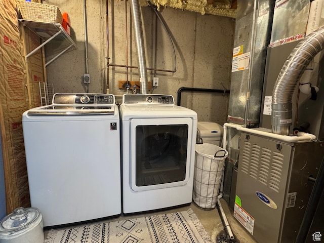 1216 N 2725 W, Layton, UT 84041 - washroom featuring washing machine and dryer and heating unit