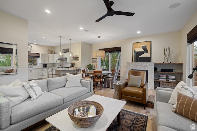 3605 W Wrangler Way, Park City, UT 84098 - living area featuring healthy amount of natural light, light wood-style flooring, ceiling fan, and recessed lighting
