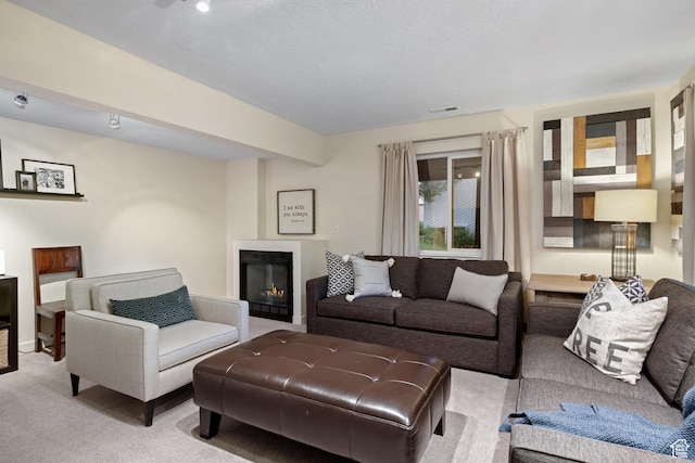 3605 W Wrangler Way, Park City, UT 84098 - living area with light colored carpet and a glass covered fireplace