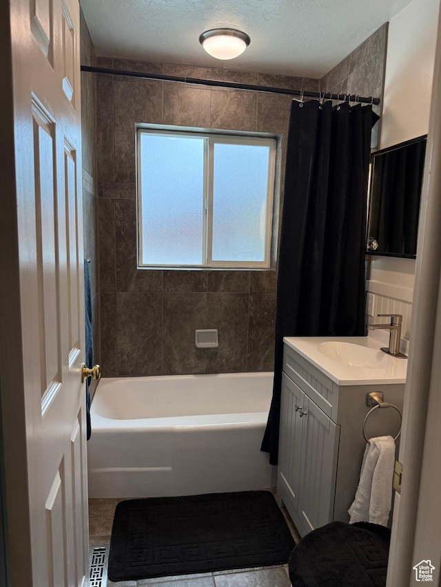 2936 E Ln Joya Dr S, Holladay, UT 84124 - full bathroom with vanity, shower / bath combo with shower curtain, and tile patterned flooring