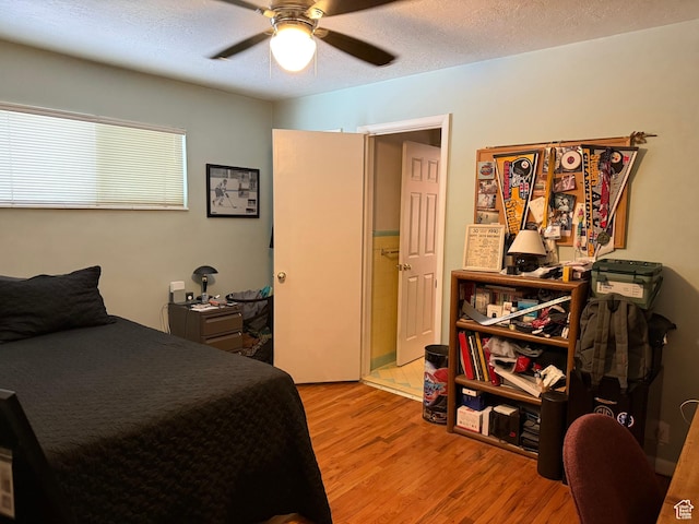 2936 E Ln Joya Dr S, Holladay, UT 84124 - bedroom with light wood-style flooring and a ceiling fan