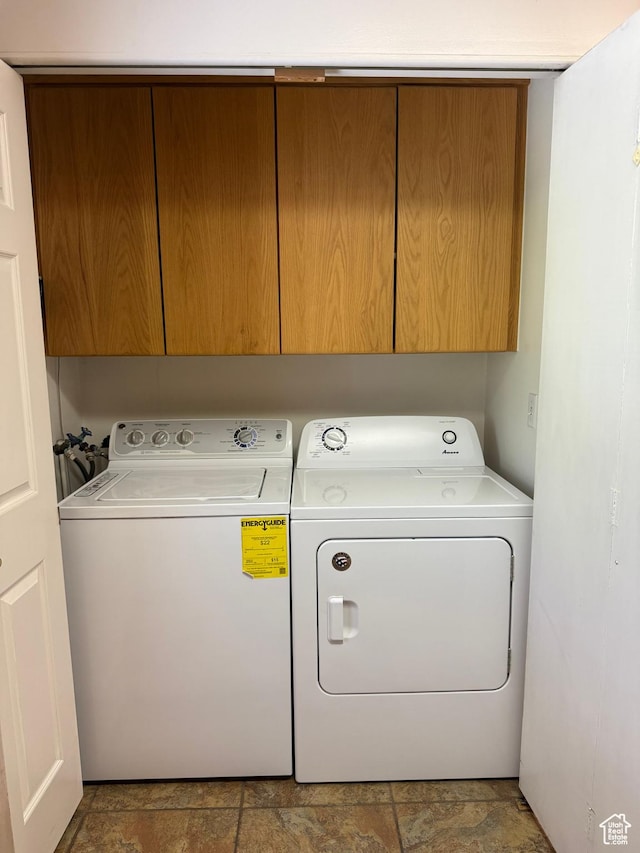 2936 E Ln Joya Dr S, Holladay, UT 84124 - laundry area featuring cabinet space, independent washer and dryer, and stone finish flooring