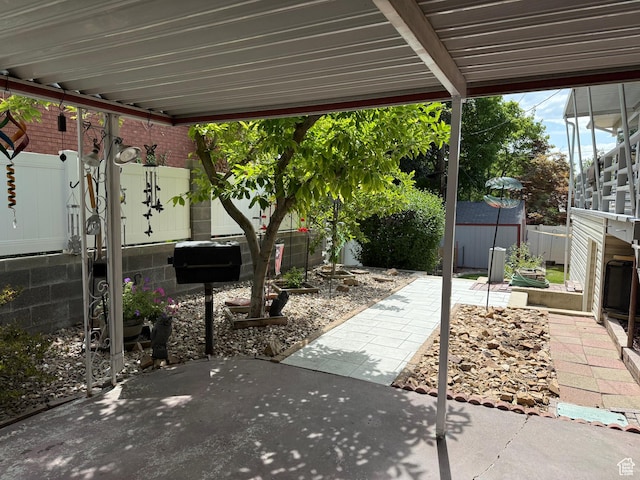 2936 E Ln Joya Dr S, Holladay, UT 84124 - fenced backyard with a patio area and a shed