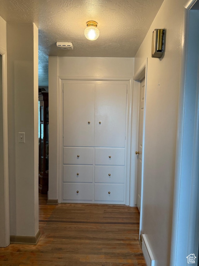 2936 E Ln Joya Dr S, Holladay, UT 84124 - corridor with wood finished floors and a textured ceiling